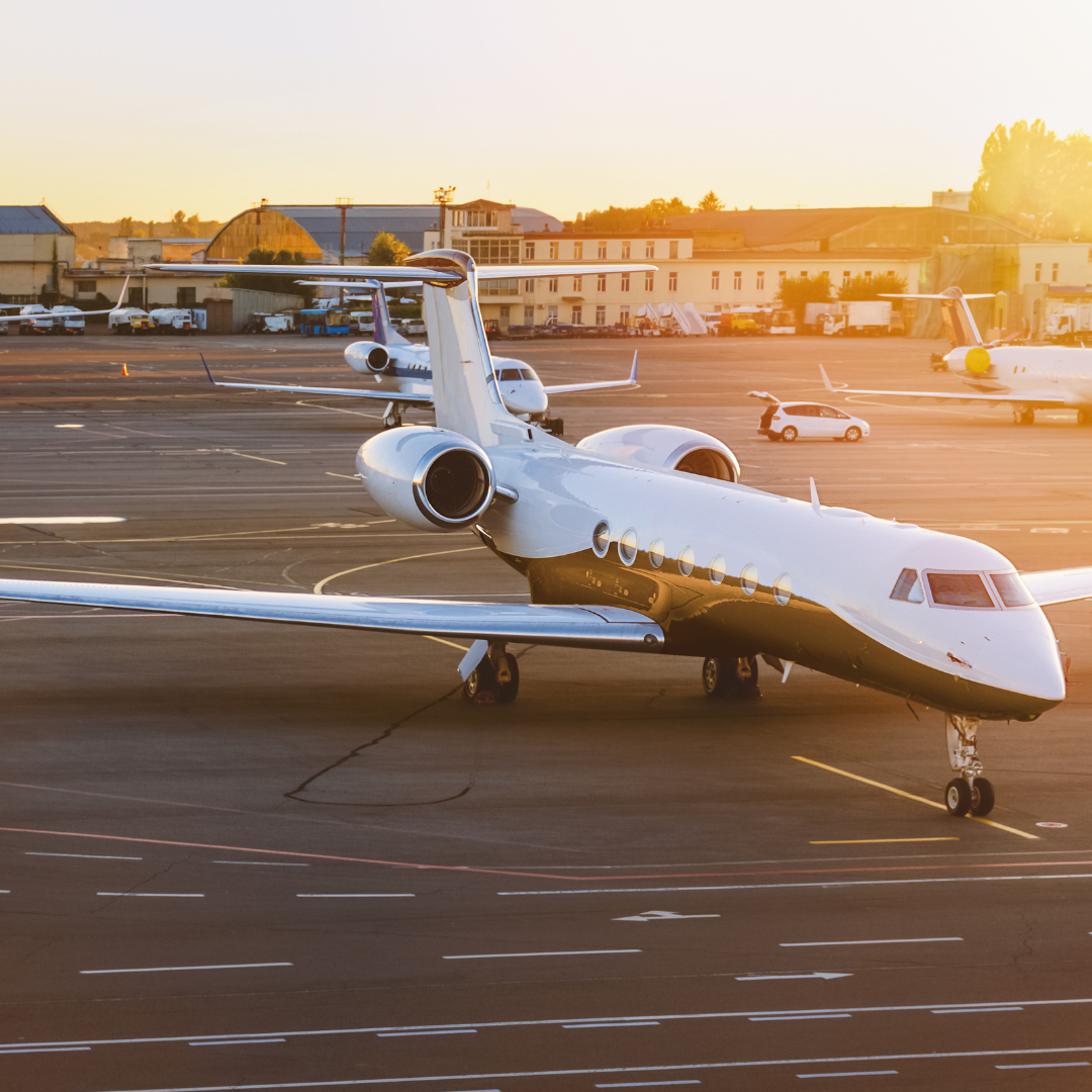 airplane stopped on tarmac at airport.